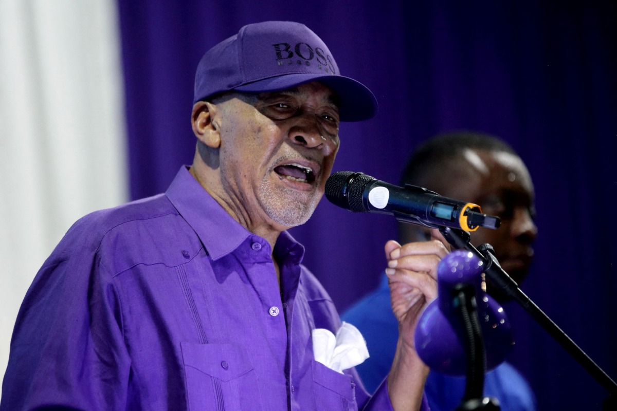 (FILES) Suriname's former President Desi Bouterse speaks during a rally at his NDP party centre, where he asked supporters to calmly wait for the High Court of Justice verdict in his appeals case against the Court Martial, in Paramaribo, on December 16, 2023. (Photo by Ranu Abhelakh / AFP)
