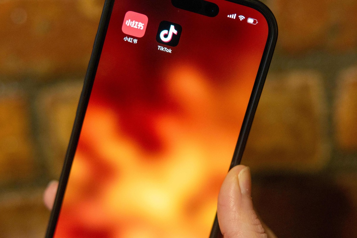 In this photo illustration, the TikTok logo is displayed on a phone on January 17, 2025 in New York City. (Photo by Alex Kent / GETTY IMAGES NORTH AMERICA / Getty Images via AFP)
