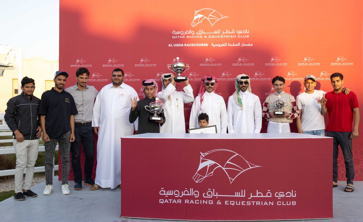 The connections of Al Judhay Cup winner Sidi Star celebrate with the trophy. Pictures: JUHAIM/QREC