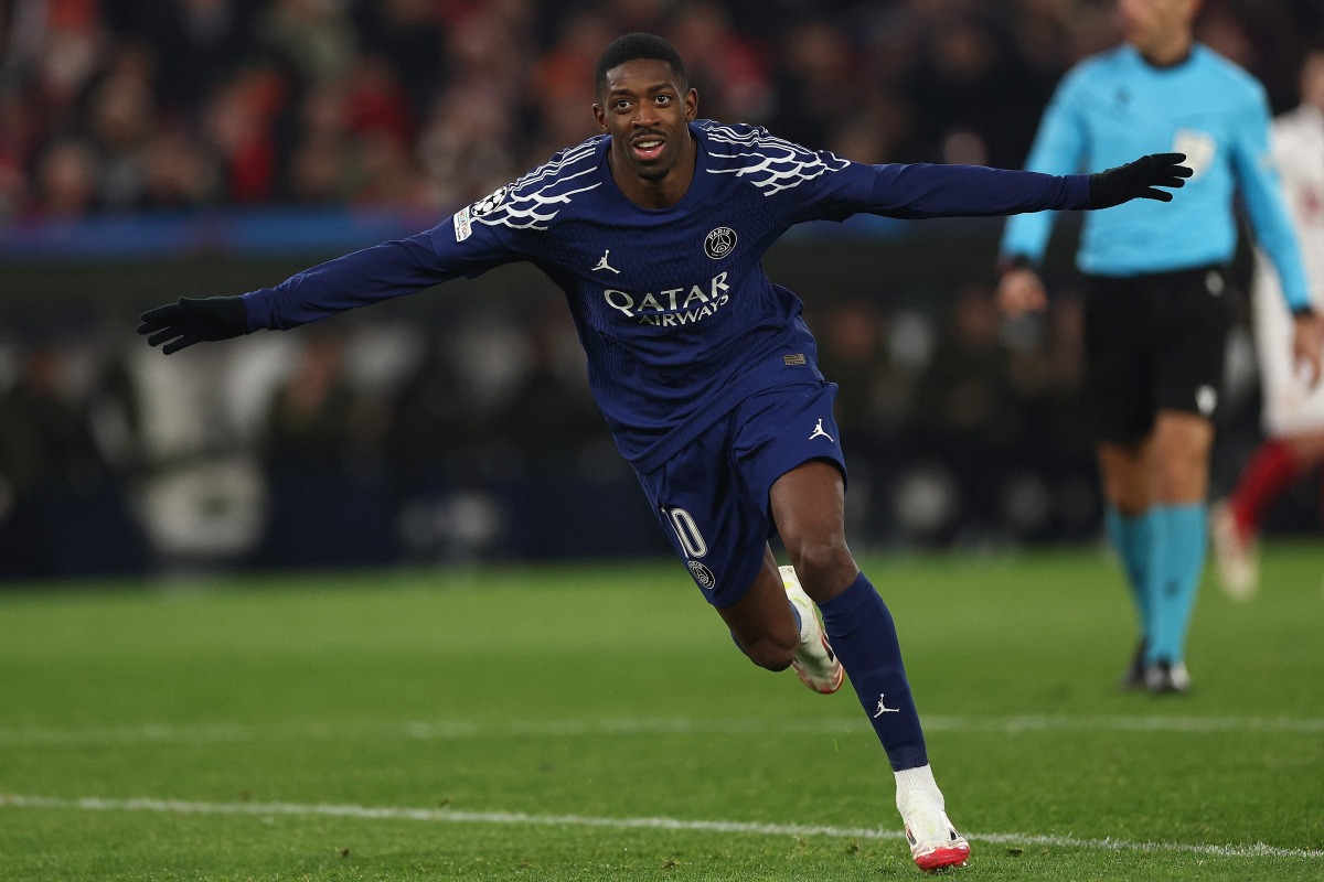 Paris Saint-Germain's French forward #10 Ousmane Dembele (L) celebrates scoring the 0-4 during the UEFA Champions League football match VfB Stuttgart vs Paris Saint-Germain in Stuttgart, southwestern Germany, on January 29, 2025. (Photo by FRANCK FIFE / AFP)
