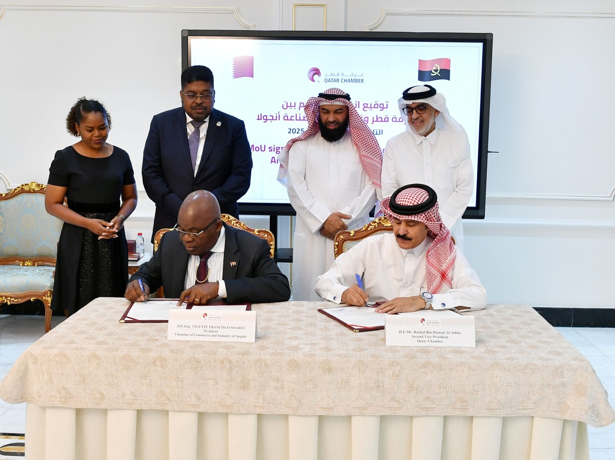 Ambassador of the Republic of Angola to Qatar, H E António Coelho Ramos da Cruz along with other officials witnessing the MoU signing by Second Vice-Chairman of Qatar Chamber, Rashid bin Hamad Al Athba, and President of the Angola Chamber of Commerce, and Industry, Eng. Vicente Soares.