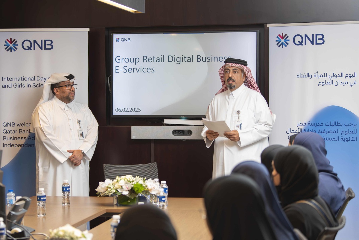QNB officials and students during the workshop.