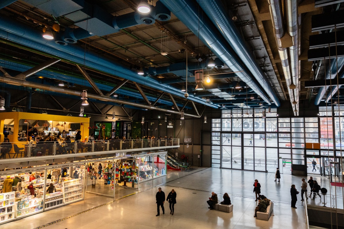 Visitors walk inside the entrance hall of the Centre national d'art et de culture Georges-Pompidou (Centre Pompidou) in Paris on February 5, 2025. Photo by Xavier GALIANA / AFP