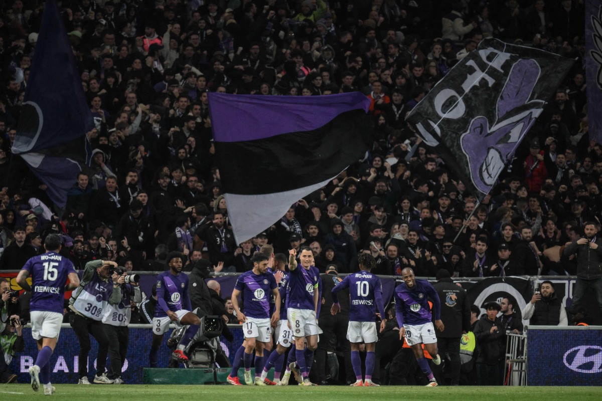 Toulouse's players celebrate after scoring a goal during the French L1 football match between Toulouse and Monaco at the Toulouse Stadium in Toulouse on March 7, 2025. (Photo by Ed JONES / AFP)
