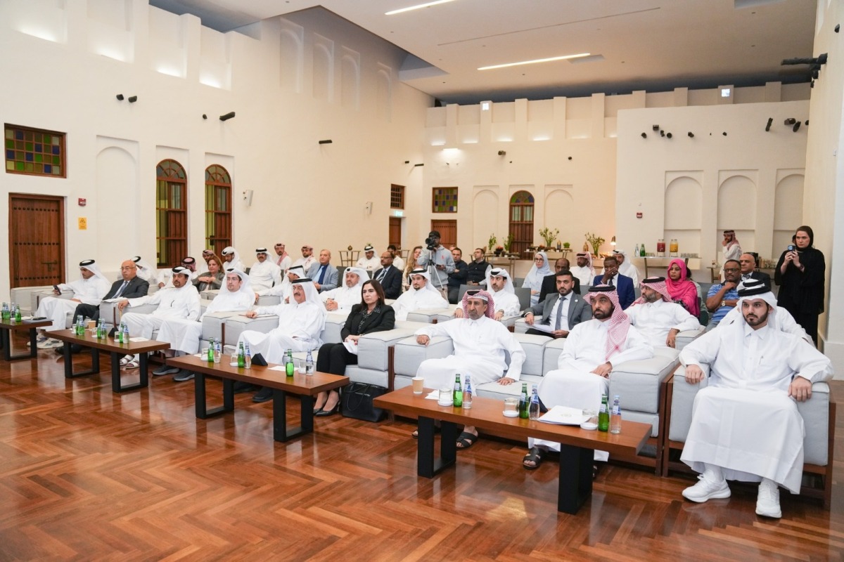 Vice-Chairman of the National Human Rights Committee H E Dr. Mohammed bin Saif Al Kuwari (centre) with other officials and guests during the event.