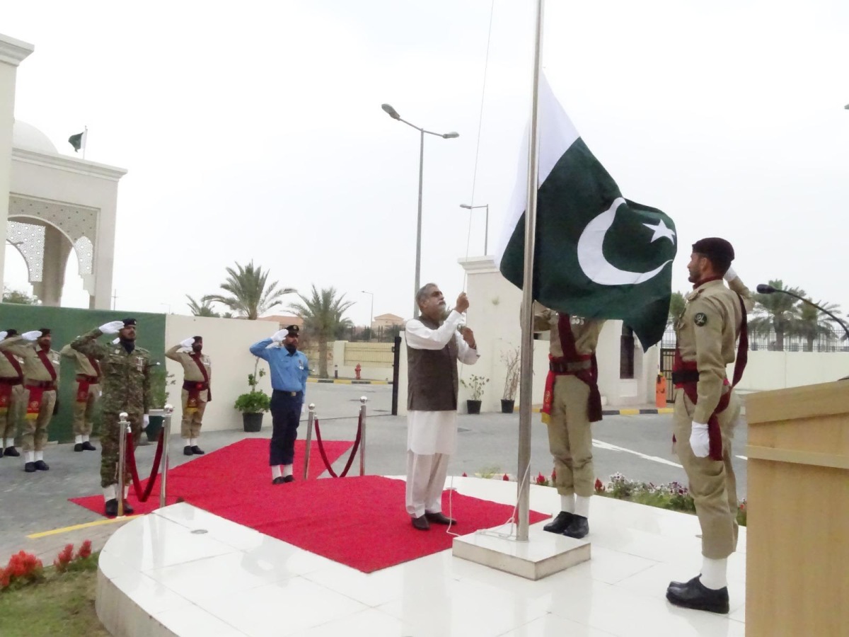 Ambassador of Pakistan to Qatar H E Muhammad Aamer hoisting the national flag at the Embassy of Pakistan premises to mark the National Day yesterday.