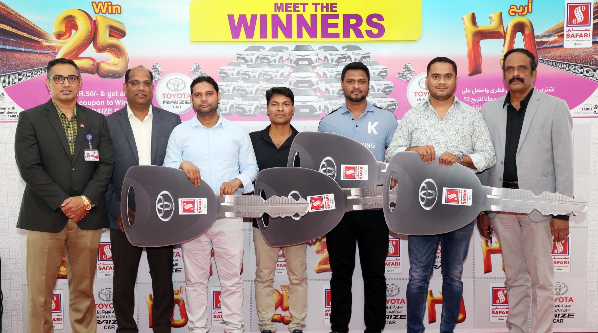 Safari officials with winners of the first lucky draw.  