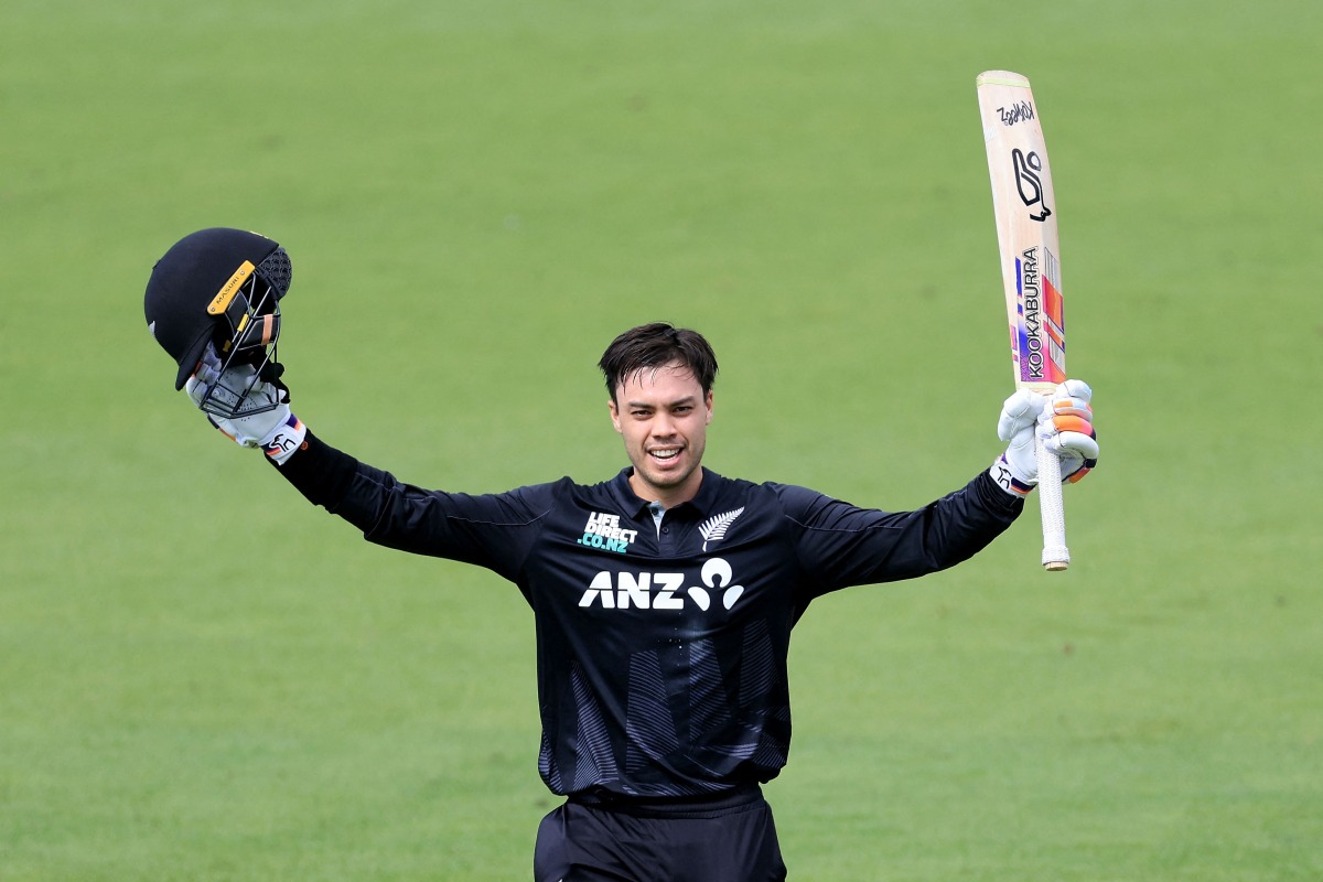 New Zealand's Mark Chapman celebrates 100 runs during the 1st ODI cricket match between New Zealand and Pakistan at McLean Park in Napier on March 29, 2025. (Photo by Marty MELVILLE / AFP)
