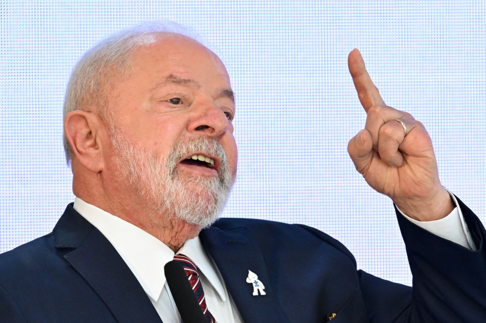 Brazilian President Luiz Inacio Lula da Silva speaks during a ministerial meeting to celebrate the first 100 days of his government at the Planalto Palace in Brasilia on April 10, 2023. (Photo by EVARISTO SA / AFP)

