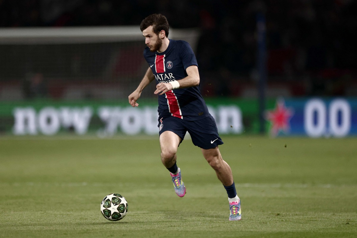 Paris Saint-Germain's Georgian forward #07 Khvicha Kvaratskhelia runs with the ball towards goal to score Paris Saint-Germain's second goal during the UEFA Champions League Quarter final first leg football match between Paris Saint-Germain (FRA) and Aston Villa (ENG) at the Parc des Princes stadium in Paris on April 9, 2025. (Photo by Thibaud MORITZ / AFP)
