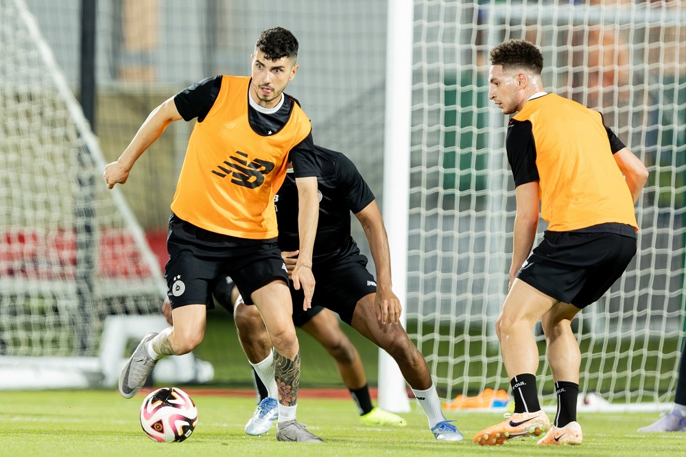 Al Sadd's Rafa Mujica (left) and Mostafa Mashaal during a training session.