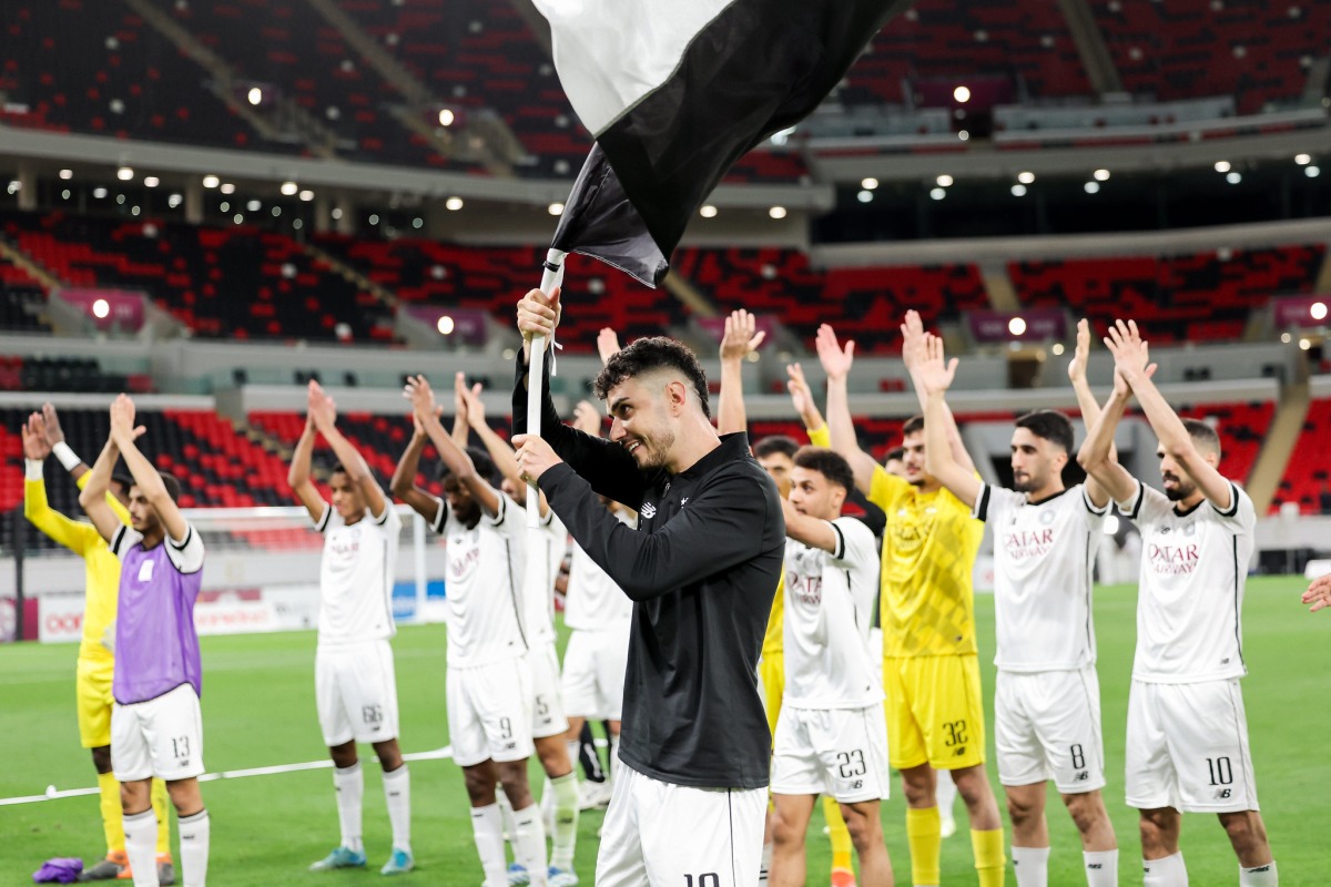 Al Sadd players celebrate after winning a match in this file photo.