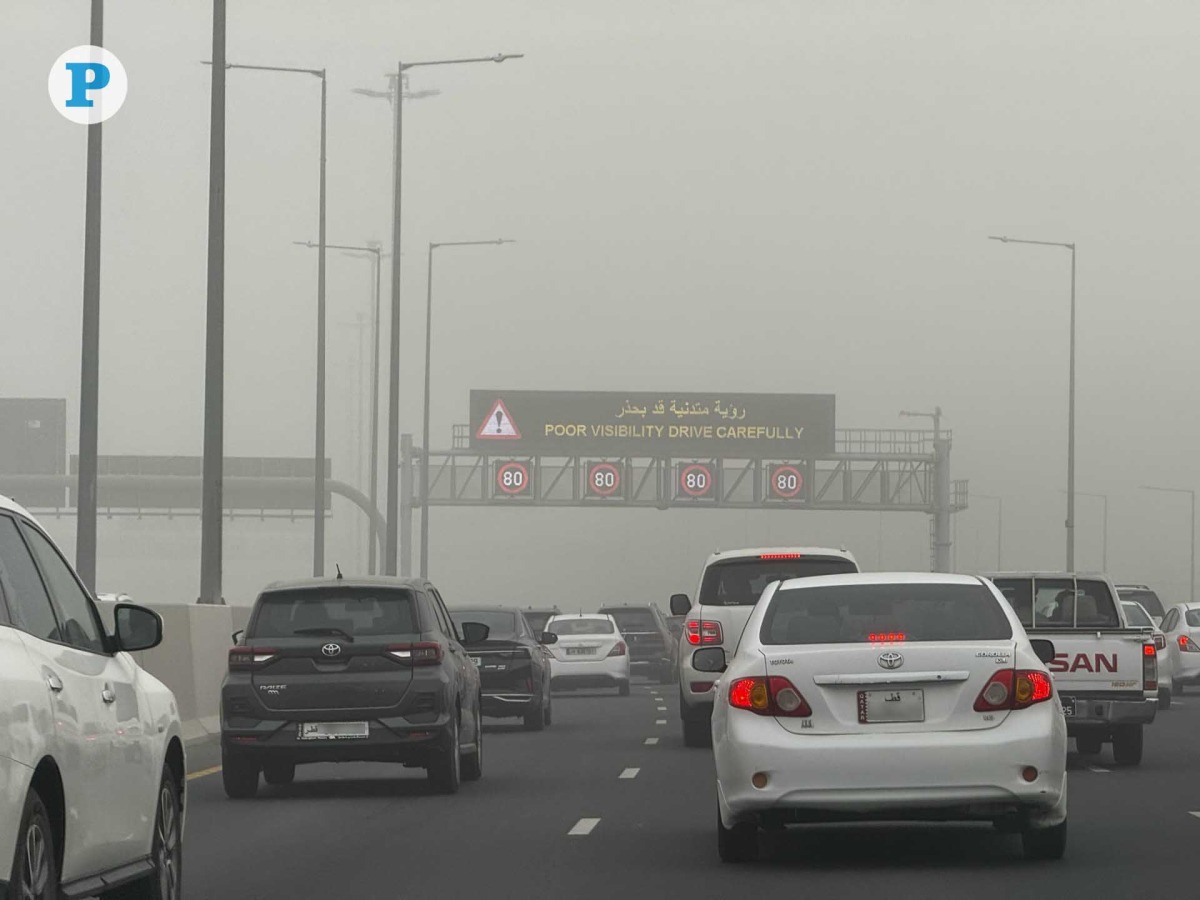 A view of reduced visibility on a road in Doha due to the dusty weather yesterday. Pic: Amr Diab/The Peninsula