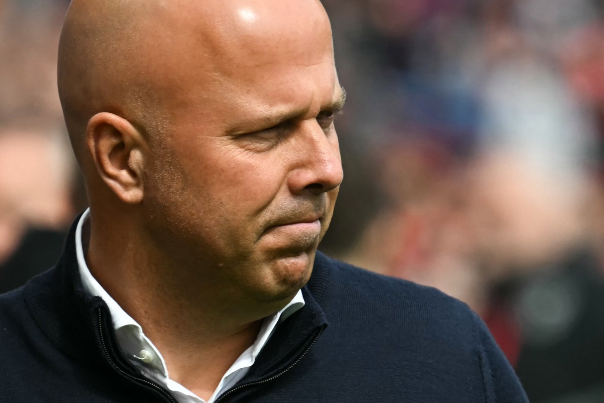 Liverpool's Dutch manager Arne Slot reacts during the English Premier League football match between Liverpool and West Ham United at Anfield in Liverpool, north west England on April 13, 2025. (Photo by Paul ELLIS / AFP)
