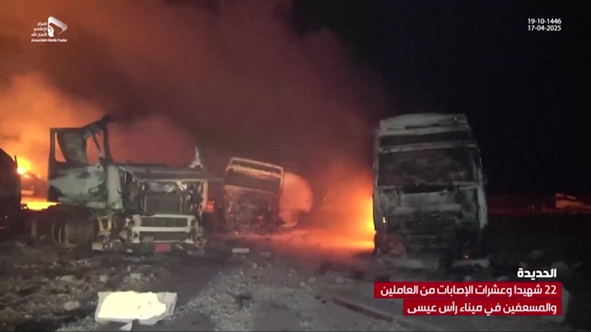 This grab taken from footage released by al-Masirah TV station of Yemen's Huthis shows fire and destruction at the site of US strikes on the Ras Issa fuel port in western Yemen on April 18, 2025. Photo by AL-MASIRAH TV / AFP.
