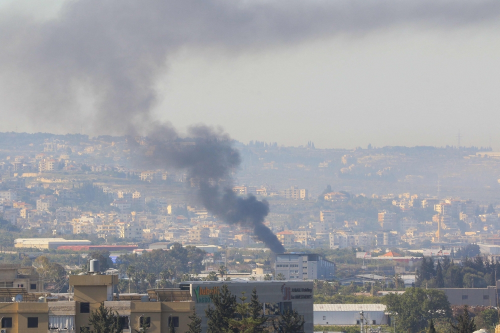 Smoke rises from the site of a reported Israeli strike in Ghazieh, near Sidon, Lebanon, on April 18, 2025. (Photo by Mahmoud Zayyat / AFP)

