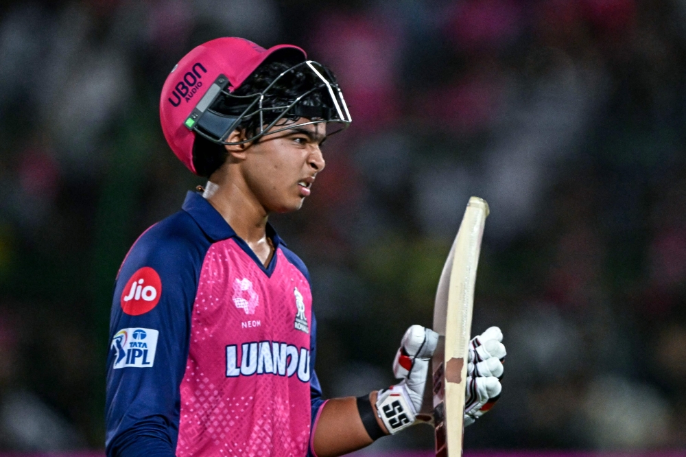 Rajasthan Royals' Vaibhav Suryavanshi reacts as he walks back to the pavilion after his dismissal during the IPL Twenty20 cricket match between Rajasthan Royals and Lucknow Super Giants on April 19, 2025. (Photo by Money Sharma / AFP) 
