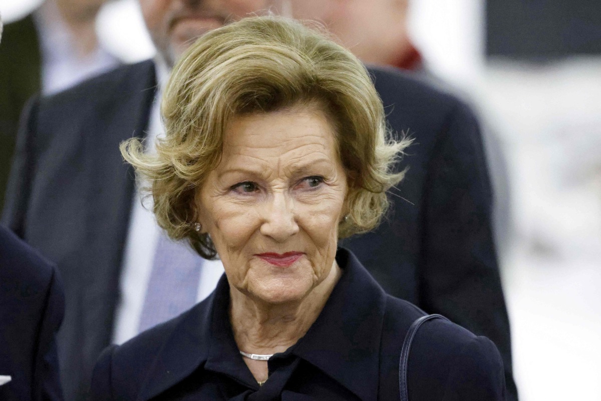 Queen Sonja of Norway reacts as she visits the 