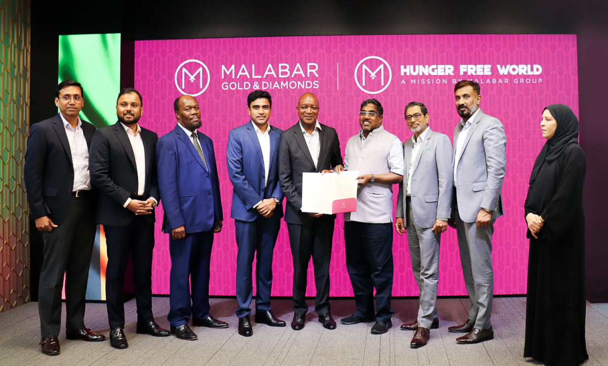 Zambia’s Minister of Education, Douglas Syakalima, with other officials as he officially unveils Malabar Group’s Hunger-Free World initiative in Zambia. 
