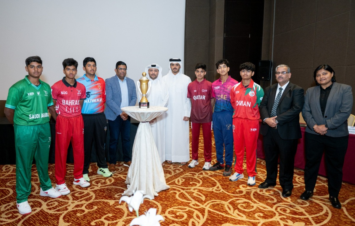 Captains of the participating teams pose for a group picture with officials.