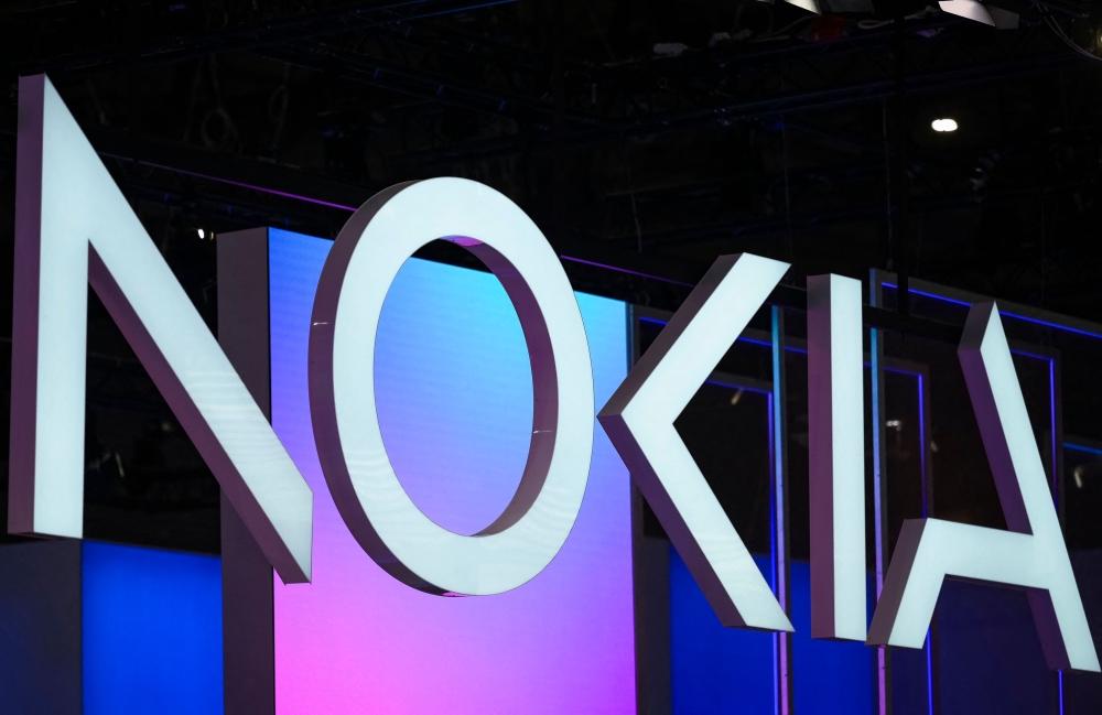 (Files) In this file photo taken on March 4, 2025 the logo of Finnish technology company Nokia is pictured at the MWC (Mobile World Congress) in Barcelona. (Photo by Josep Lago / AFP)