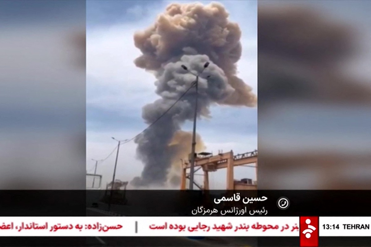 This image grab taken from footage released by the state television Islamic Republic of Iran Broadcasting News (IRIBNEWS) on April 26, 2025 shows smoke billowing following an explosion at the Shahid Rajaee port dock southwest of Bandar Abbas in the Iranian province of Hormozgan. Photo by IRIBNEWS / AFP.