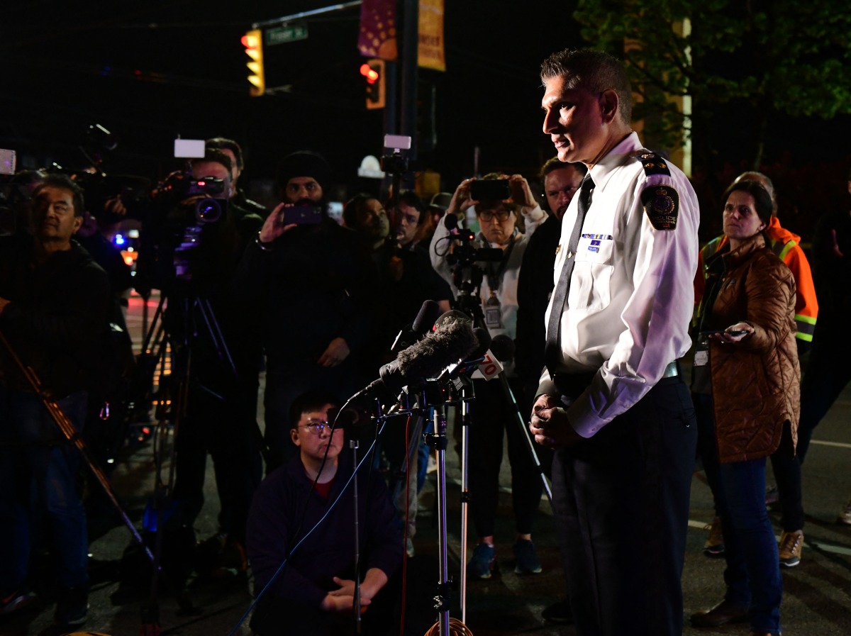 Steve Rai, Vancouver Police interim police chief, speaks during a news conference that there had been a vehicle and a suspect involved in an incident at the annual Lapu Lapu festival celebrating Filipino culture, at East 43rd Avenue and Fraser, in the south of Vancouver on April 26, 2025. Photo by Don MacKinnon / AFP.
