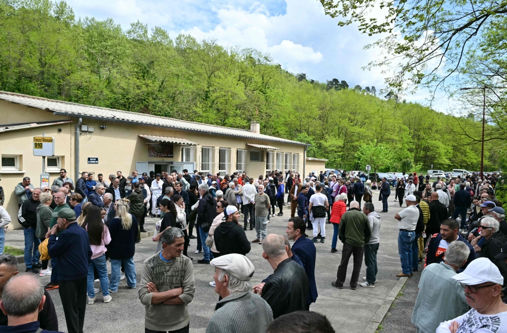 People gather outside the mosque Khadija in La Grand-Combe, southern France, on April 27, 2025, to pay tribute to Aboubakar. (Photo by Miguel Medina / AFP)
