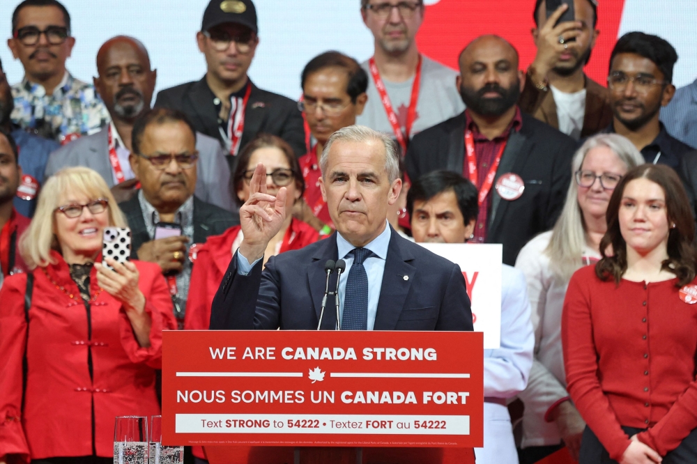 Canada's PM and Liberal Party leader Mark Carney speaks at a victory party in Ottawa, Ontario on April 29, 2025. (Photo by Dave Chan / AFP)