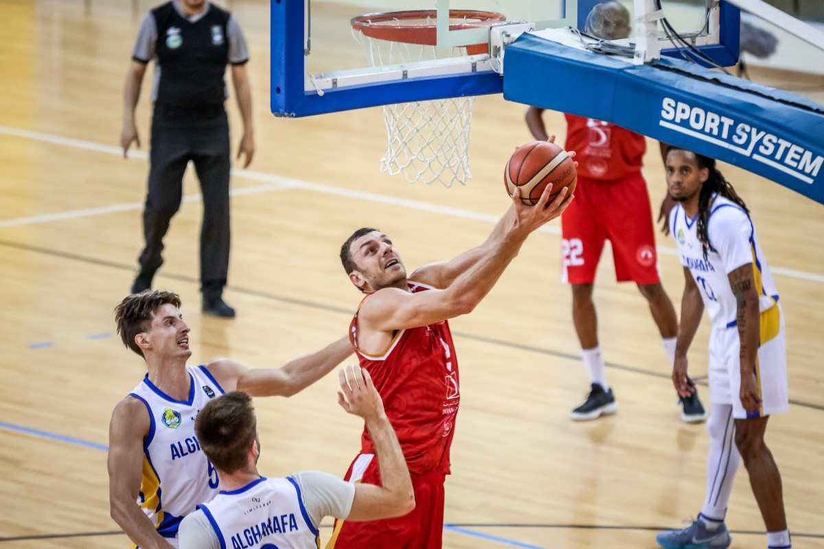 Al Arabi’s Elmedin Kikanovic prepares to shoot.