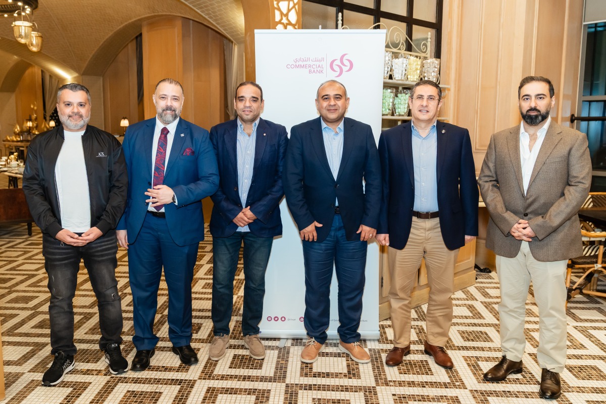 Officials pose for a group photo during the event.