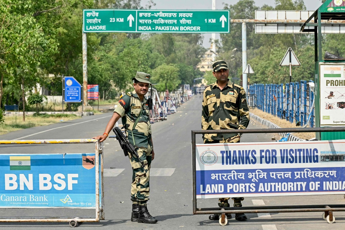 Indian Border Security Force (BSF) personnel stand guard near the India-Pakistan Wagah border post, about 35kms from Amritsar on May 3, 2025. (Photo by Narinder NANU / AFP)
