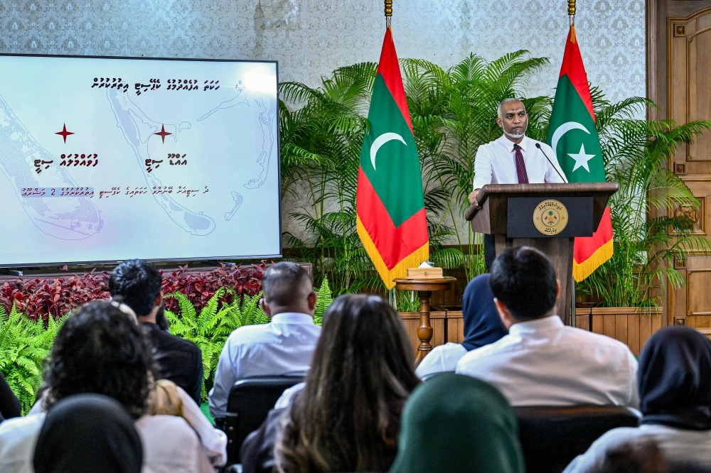 This handout photograph taken and released by the Maldives President Office on May 3, 2025 shows Maldives President Mohamed Muizzu speaking during a marathon press conference in Male. (Photo by Maldives President Office / AFP) 