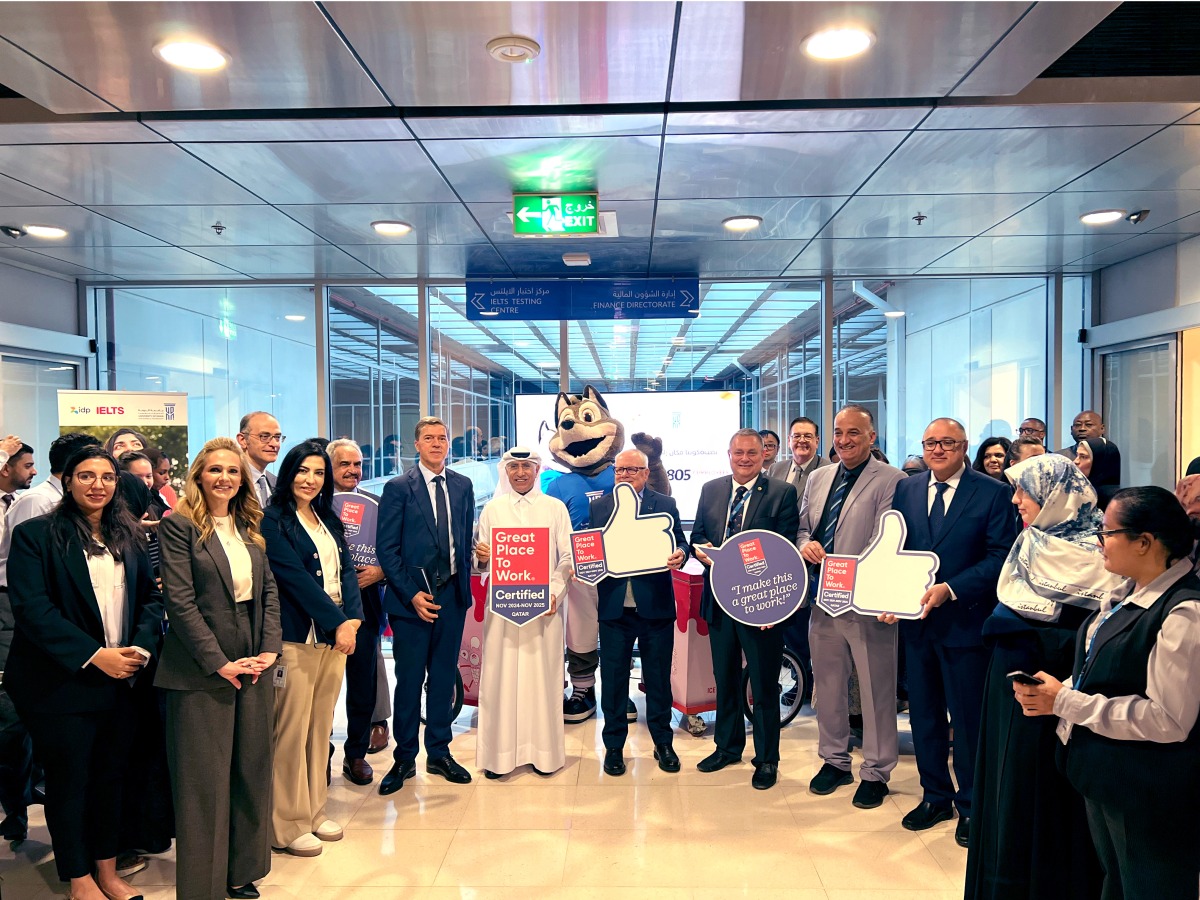 Dr. Salem Al-Naemi, President of the UDST, and other officials displaying the certification on the occasion of the UDST being recognised as Great Place to Work for the third consecutive year.