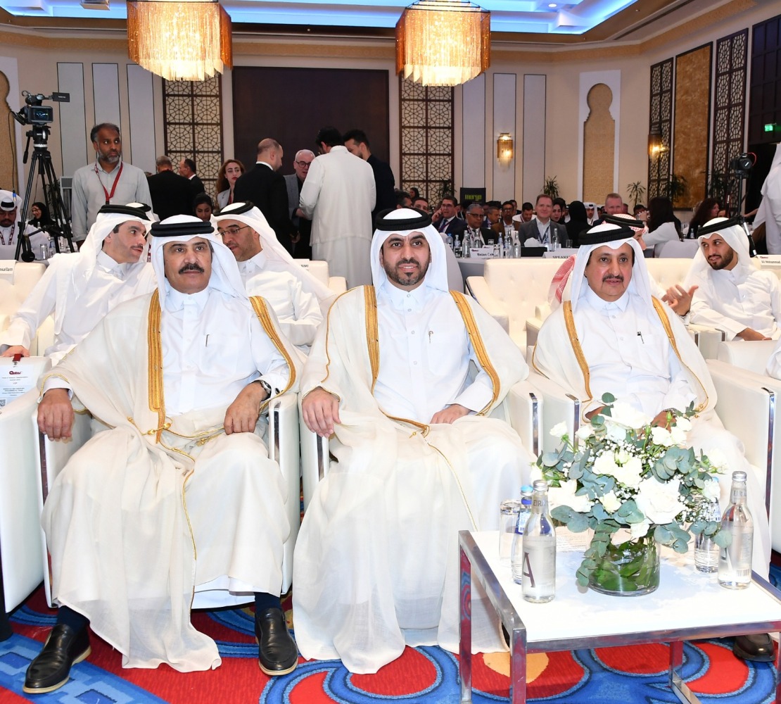 Undersecretary of Ministry of Commerce and Industry, H E Mohammed bin Hassan Al Malki; Chairman of Qatar Chamber and International Chamber of Commerce Qatar, Sheikh Khalifa bin Jassim Al Thani with other dignitaries at the Qatar Trade and Treasury Transformation Summit, yesterday.