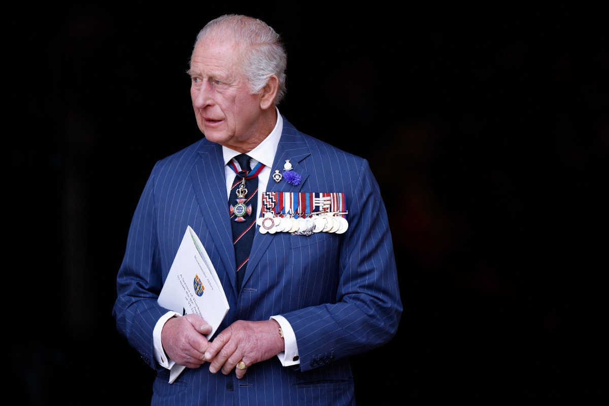Britain's King Charles III leaves after attending a service of thanksgiving to mark the 80th anniversary of VE Day, or Victory in Europe Day, marking the end of the Second World War in Europe, at Westminster Abbey in London on May 8, 2025. (Photo by BENJAMIN CREMEL / AFP)