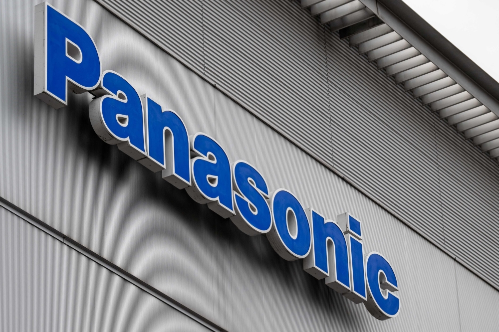 The logo of Japanese electronics giant Panasonic is seen outside the Panasonic Centre in Tokyo on February 2, 2023. (Photo by Philip Fong / AFP)
 