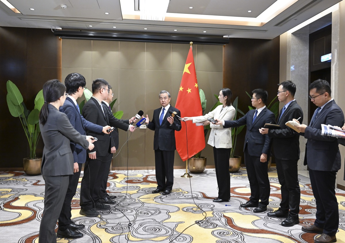 Chinese Foreign Minister Wang Yi, also a member of the Political Bureau of the Communist Party of China Central Committee, speaks during a press briefing in Moscow, Russia, May 9, 2025. (Xinhua/Zhang Ling)
