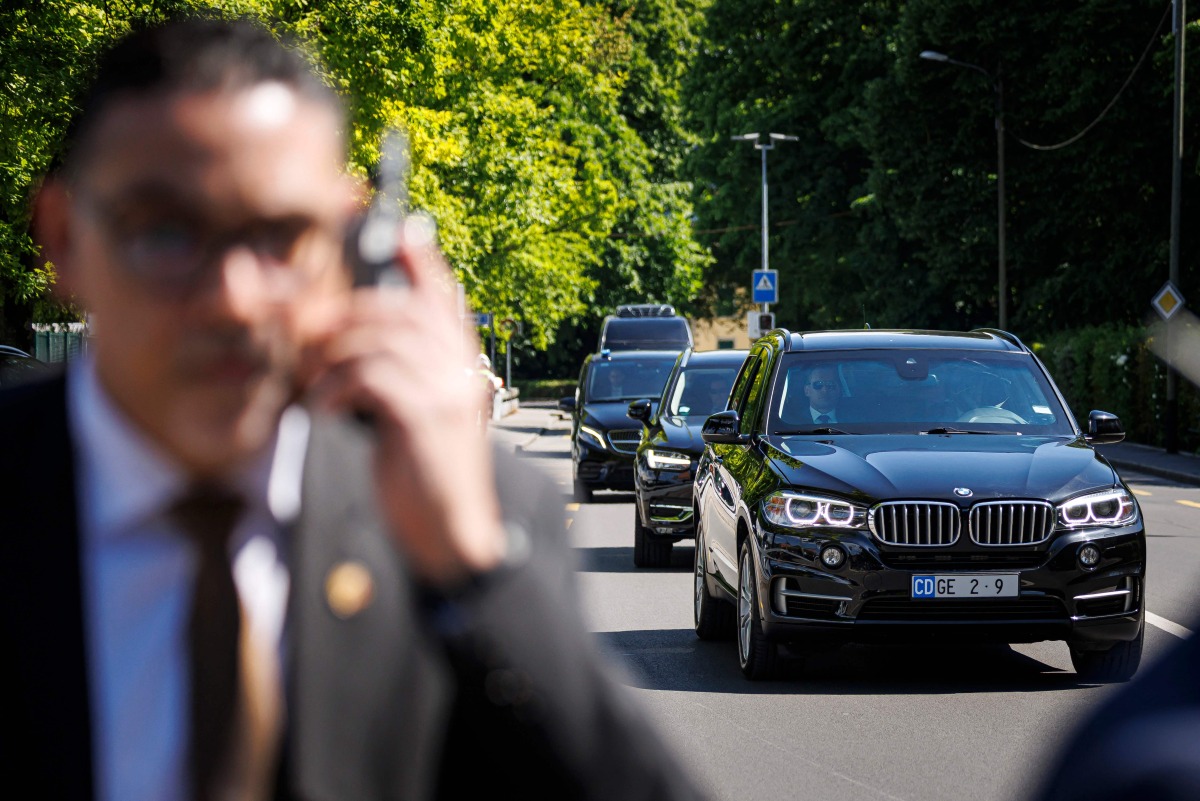 The convoy carrying the US Secretary of Treasury arrives to the residency of the permanent Swiss Ambassador to the United Nations offices in Geneva during talks between Seniors US and Chinese officials on tariffs, in Geneva on May 11, 2025. (Photo by VALENTIN FLAURAUD / AFP)
