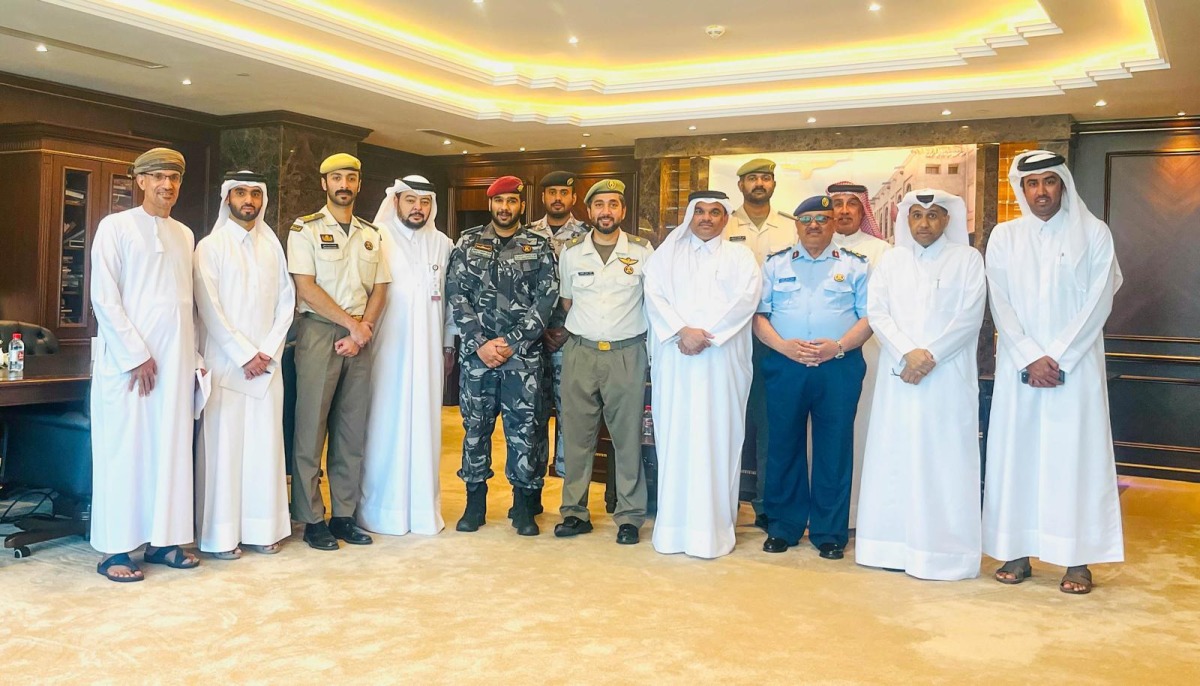 Assistant Undersecretary for Protection and Natural Reserves Affairs at MECC Dr. Ibrahim Abdul Latif Al-Muslemani with other officials during the event. 