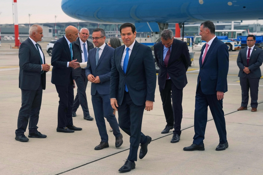 US Secretary of State Marco Rubio (C) arrives at Istanbul international airport, in Istanbul, on May 16, 2025. (Photo by Francisco Seco / Pool / AFP)
 