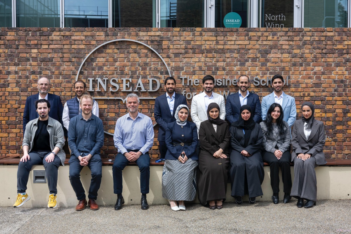 Officials pose for a group photo during the programme hosted by MCIT in France.
