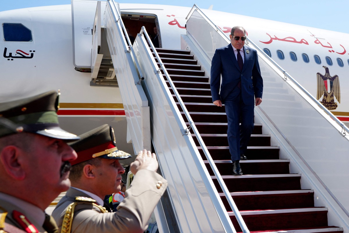 Egypt's President Abdel Fattah al-Sisi arrives in Baghdad ahead of the 34th Arab League summit on May 17, 2025. (Photo by Murtadha AL-SUDANI / POOL / AFP)
