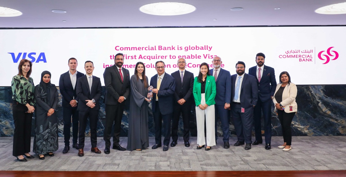 Commercial Bank and Visa officials during the event. 