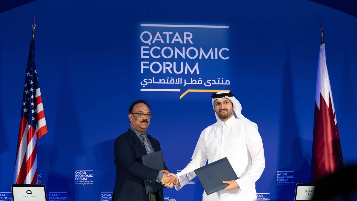 Officials during the signing ceremony at Qatar Economic Forum.