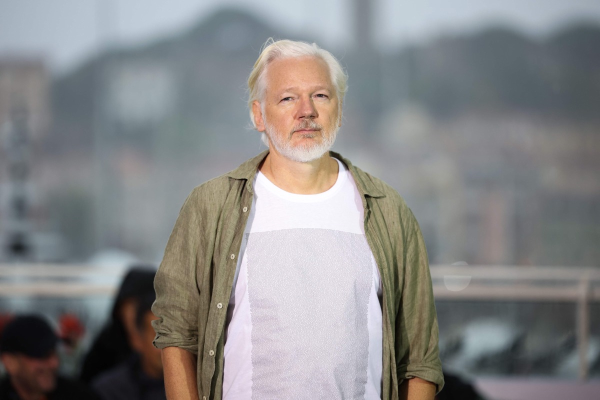 Australian publisher, activist Julian Assange poses during a photocall for the film 