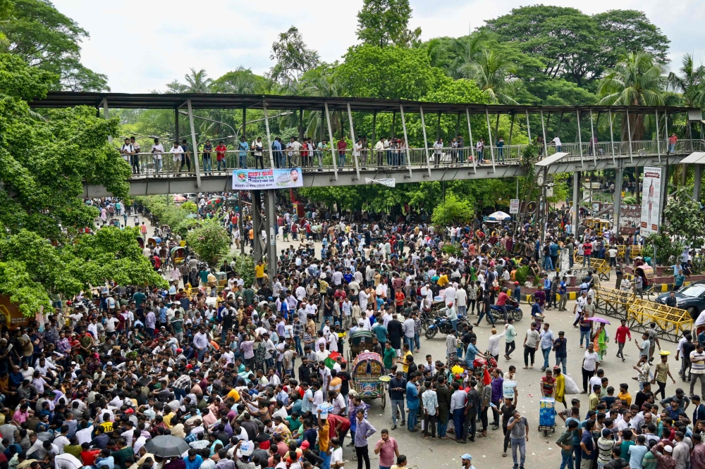 Bangladesh Nationalist Party (BNP) supporters gather near the chief adviser's residence in Dhaka on May 21, 2025, demanding BNP's Hossain as the capital's mayor. (Photo by Munir Uz Zaman / AFP)