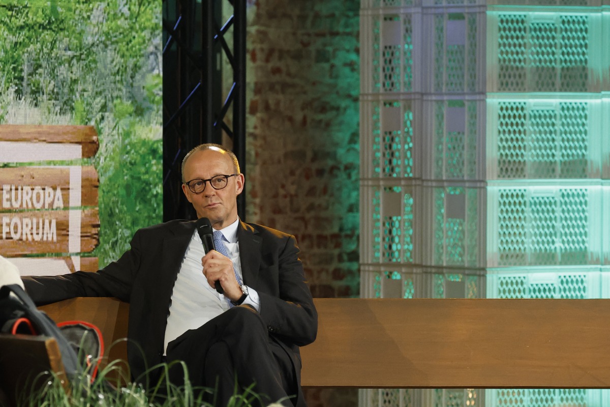 German Chancellor Friedrich Merz takes part in a discussion on 'Wars, crises, chancellorship: German answers to European questions' on stage of the 'Re:Publica 25' fair ground during the opening of the 'Re:publica 25' digital conference in Berlin on May 26, 2025. Photo by Odd ANDERSEN / AFP.