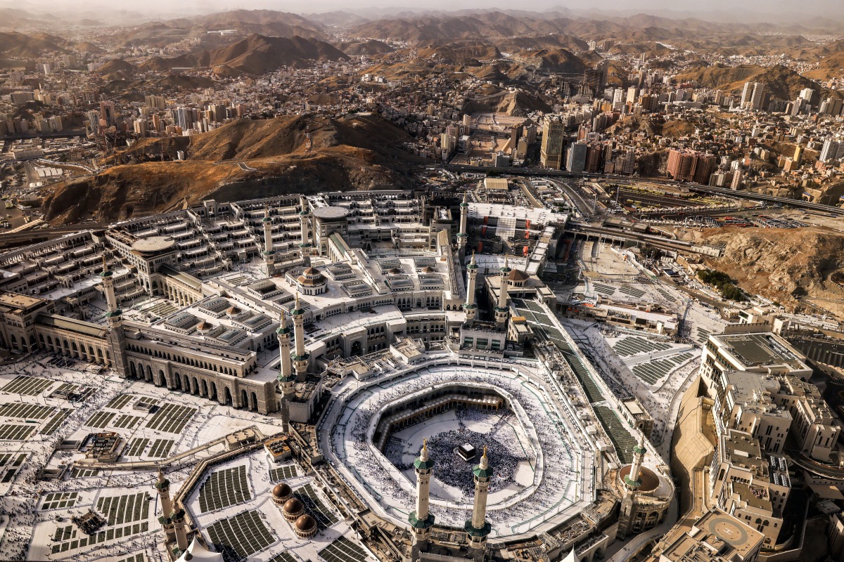 This picture shows a view of Islam's holy city of Mecca with Muslim worshippers at the Grand Mosque complex ahead of the annual Hajj pilgrimage on June 1, 2025. Photo by HAZEM BADER / AFP.