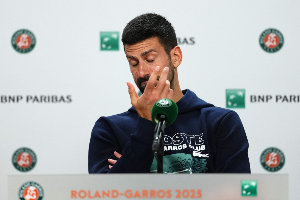 Serbia's Novak Djokovic holds a press conference after he lost his men's singles semi-final match against Italy's Jannik Sinner in Paris on June 6, 2025. (Photo by Dimitar Dilkoff / AFP)
 